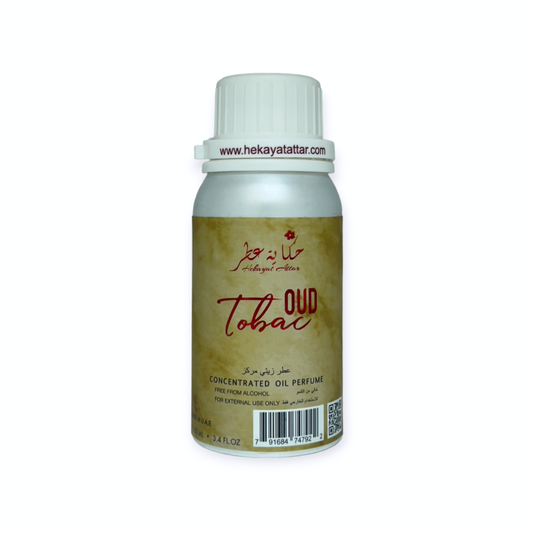 Oud Tobac by hekayat Attar bottle on a white background