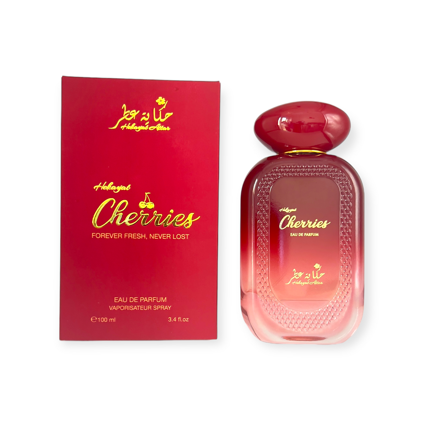 Cherries by Hekayat Attar bottle with packing on a white background