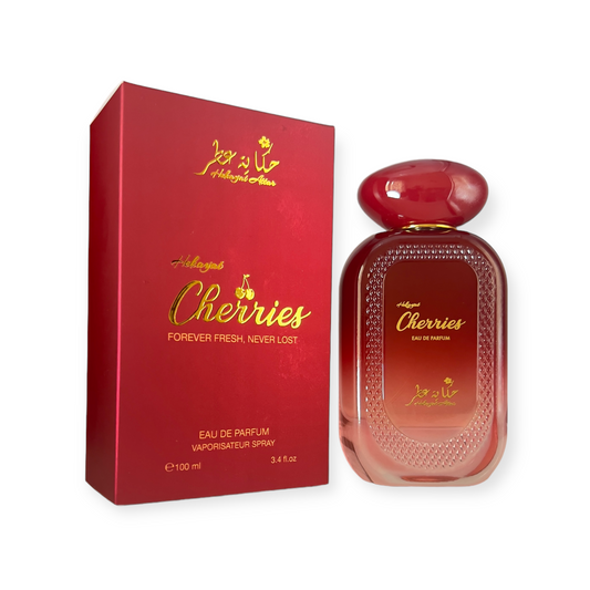 Cherries by Hekayat Attar bottle with packing on a white background