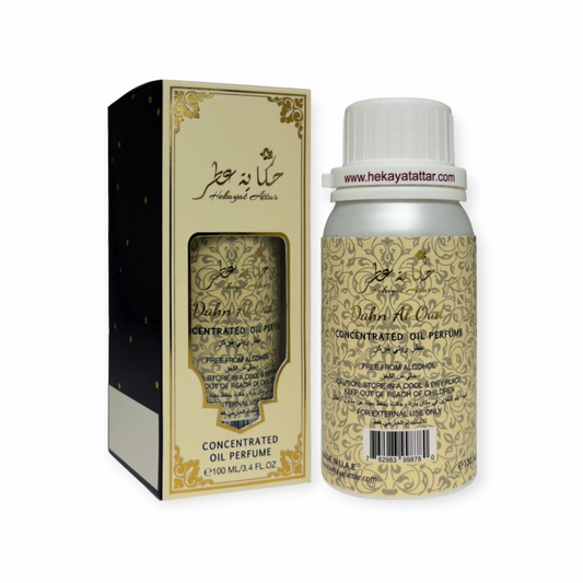 Dahn Al Oud by Hekayat Attar bottle with packaging on a white background