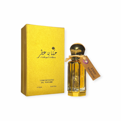 Elixir Maharaj 12 ml Oil perfume by Hekayat Attar bottle with packaging on a white background