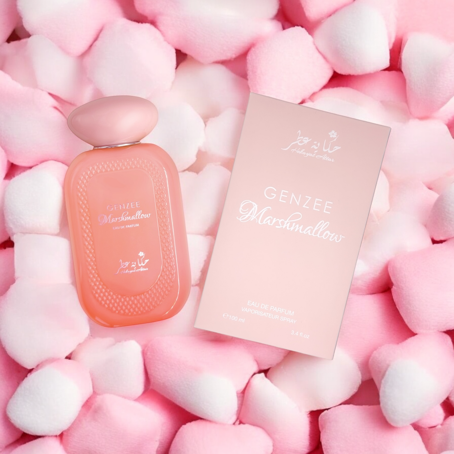 Genzee Marshmallow perfume bottle by Hekayat Attar and packaging on a  Marshmallow background