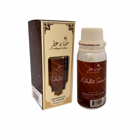 Mukhallat Emarat by Hekayat Attar Bottle with packaging on a white background