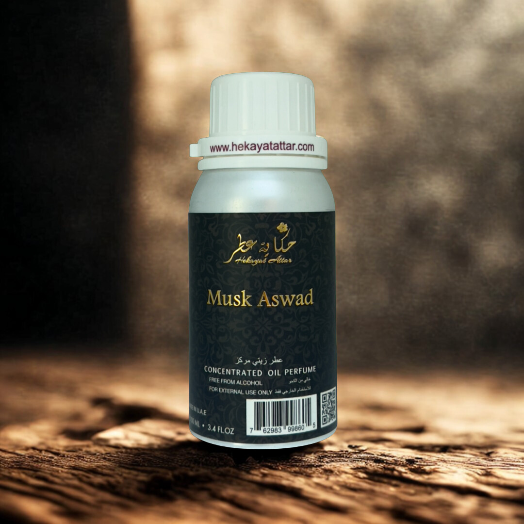 Musk Aswad 100 ML OIL PERFUME by Hekayat Attar Bottle and packaging with luxury background