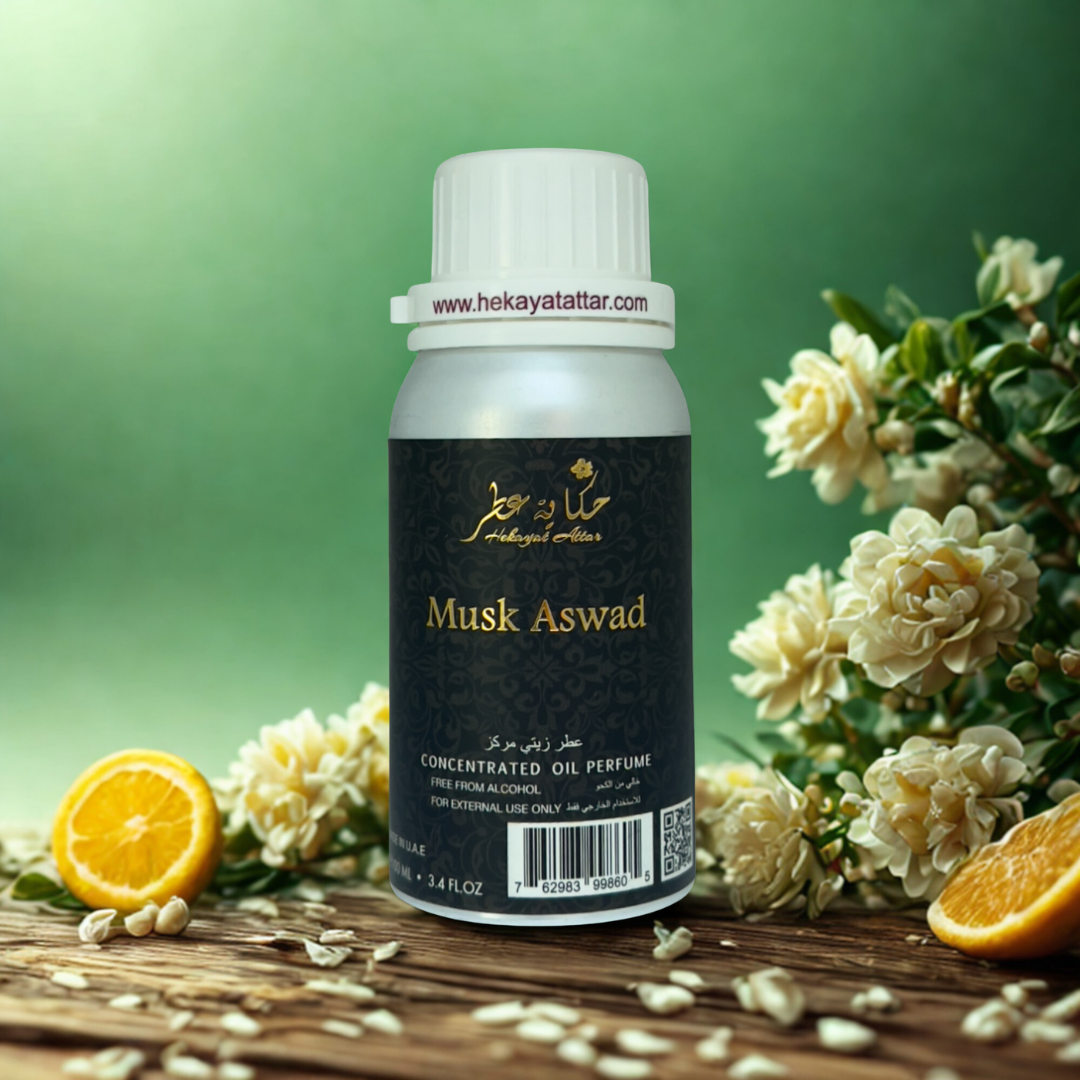 Musk Aswad 100 ML OIL PERFUME by Hekayat Attar Bottle and packaging with luxury background