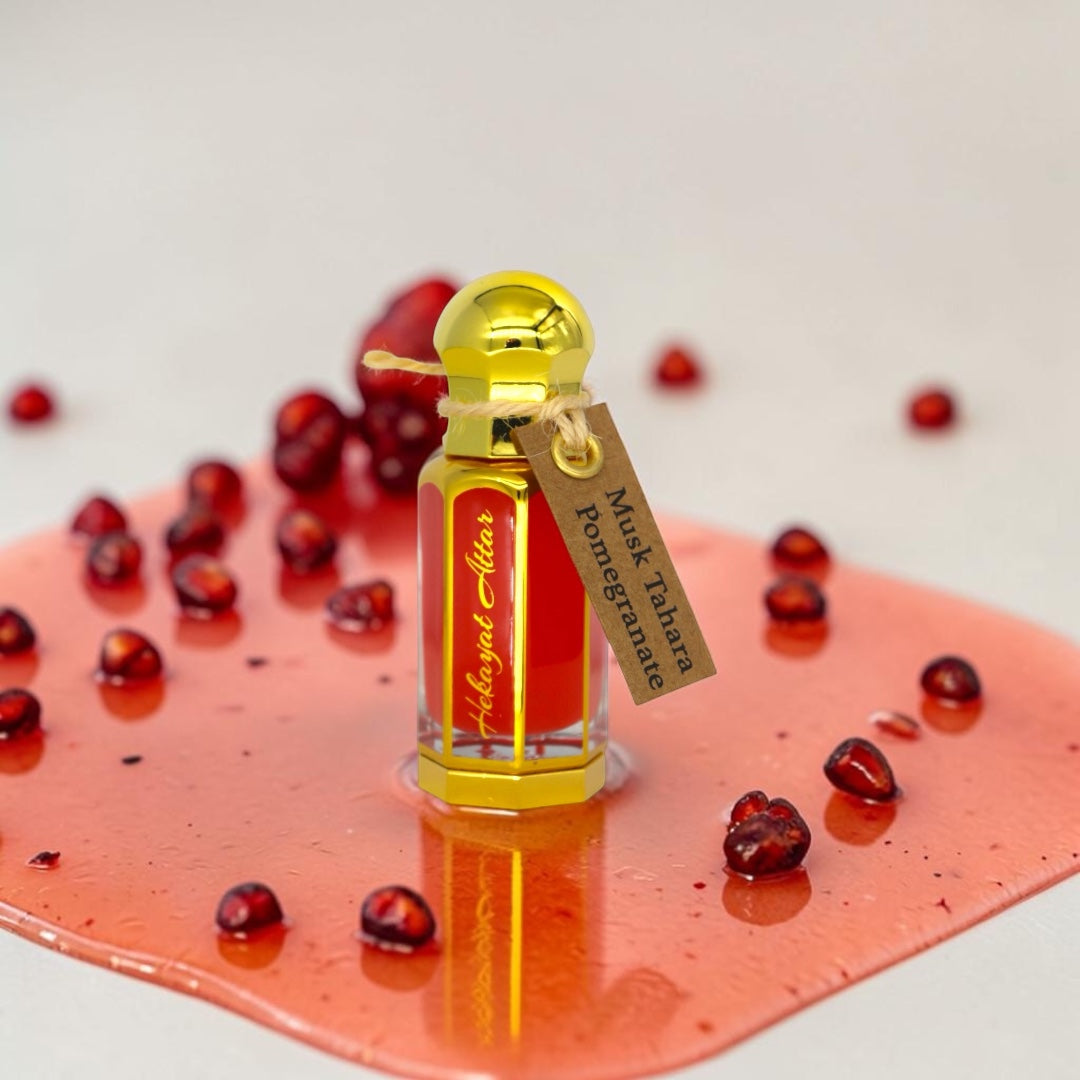 hekayat attar branded musk tahara pomegranate displayed with pomegranate