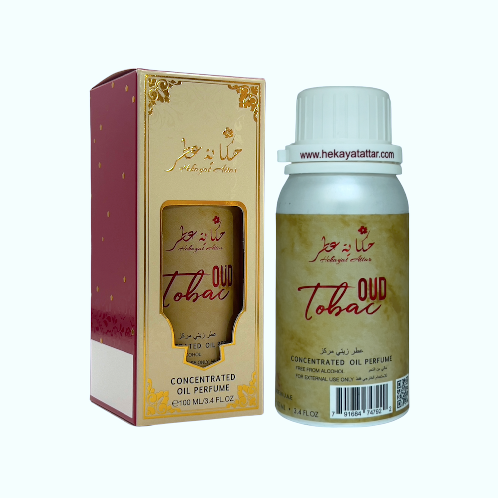 Oud Tobac by hekayat Attar bottle with packaging on a white background