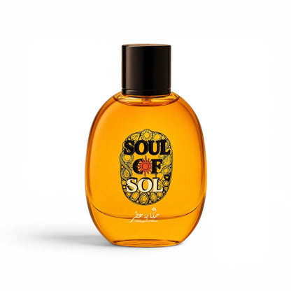 A bottle of Soul of Sol Eau de Toilette fragrance by Hekayat Attar, featuring an amber-colored glass bottle with a black cap and a detailed circular label.