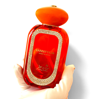 The Worlds most expensive Vanilla bottle by Hekayat Attar branded on hand with white background