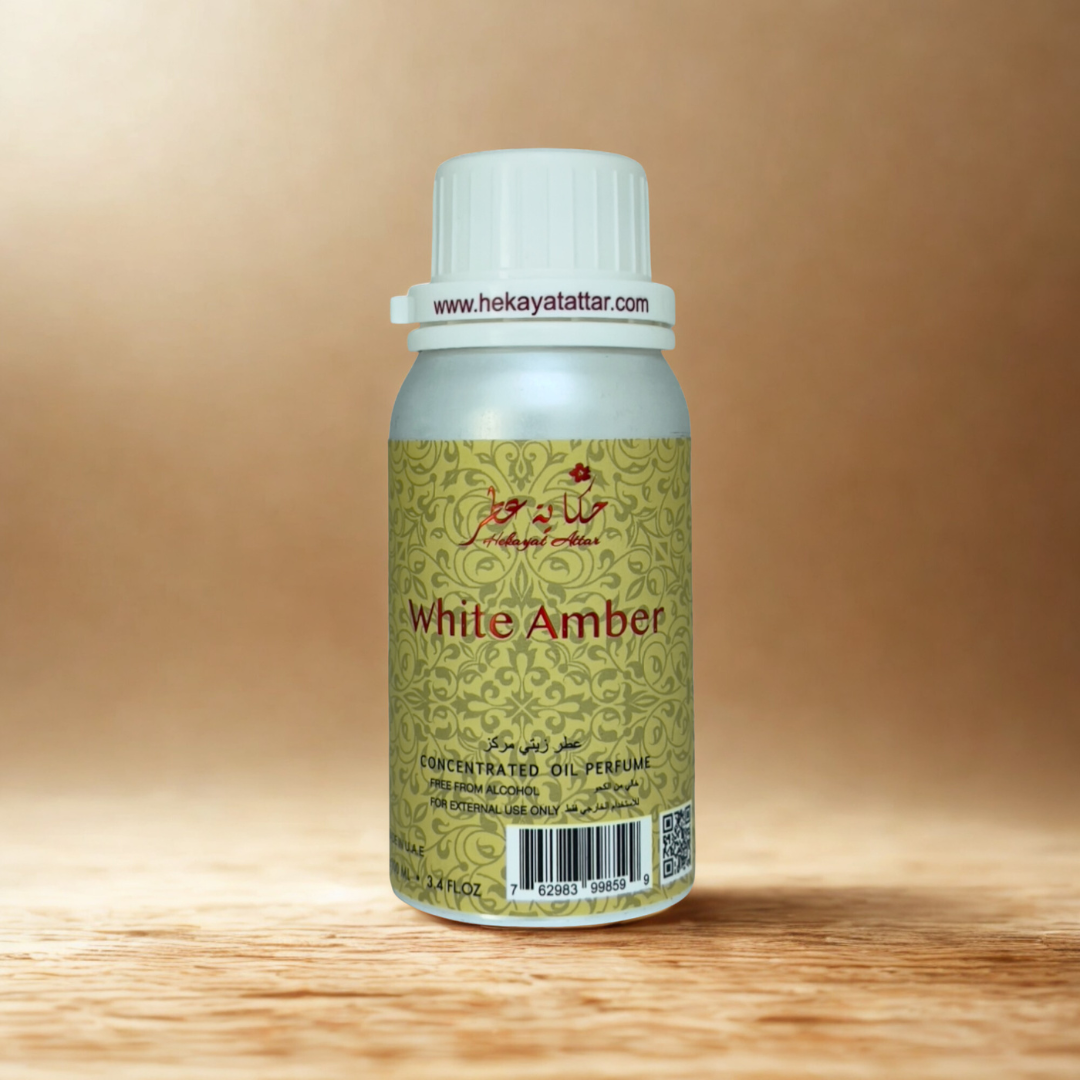 WHITE AMBER by Hekayat Attar bottle with luxury background