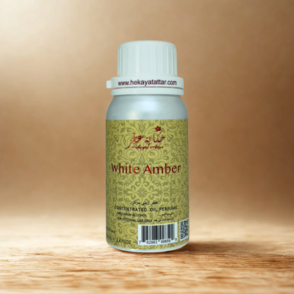 WHITE AMBER by Hekayat Attar bottle with luxury background
