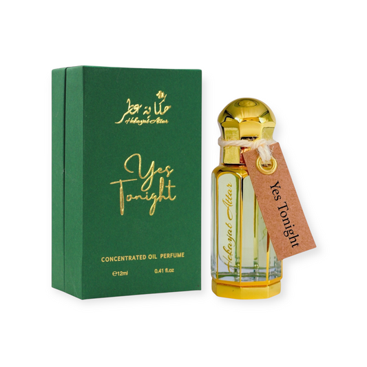 Yes tonight by Hekayat Attar bottle with packaging on a white background