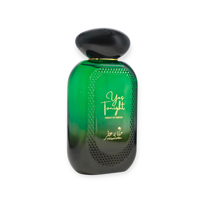 Green 'Yestonight' perfume bottle by Hekayat Attar on a white background