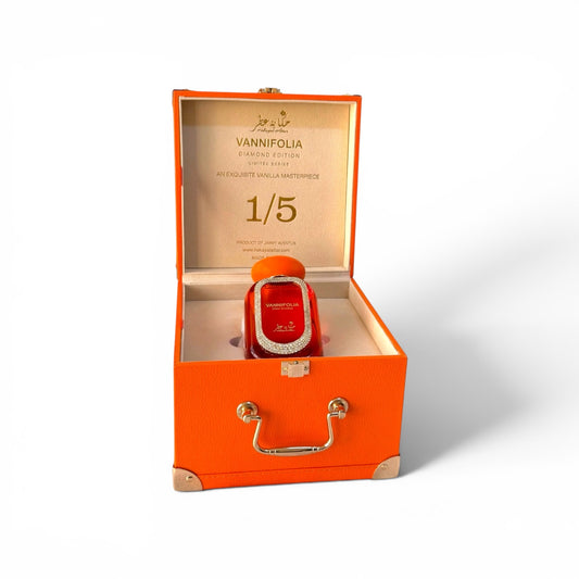 The Worlds most expensive Vanilla Perfume in an orange box with 'Vannifolia' branding on a white background